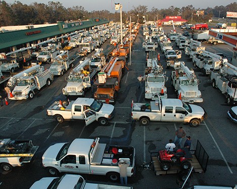 Many electrical line repair vehicles ready to work