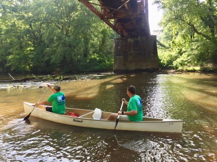 Volunteers in a canoe