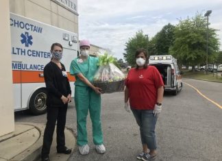Metering Analyst Mona Jackson drops off a care basket to the staff at Anderson Regional Medical Center in Meridian.