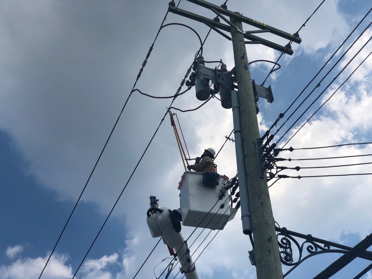 A Mississippi Power lineman works to restore service in White Plains, N.Y., on Monday afternoon.