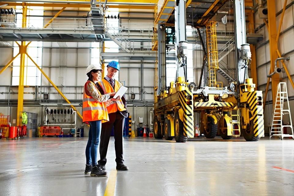 Man and woman in warehouse