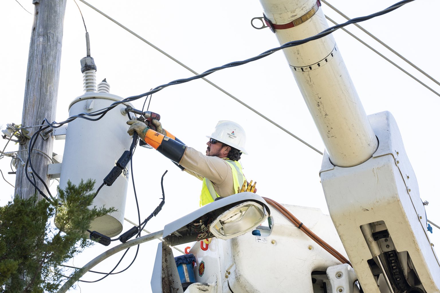 Mississippi Power employee working on electrical lines