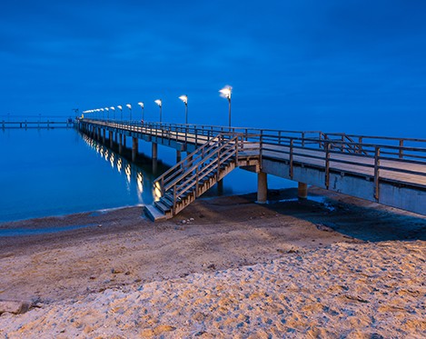 Lighted fishing dock over the gulf