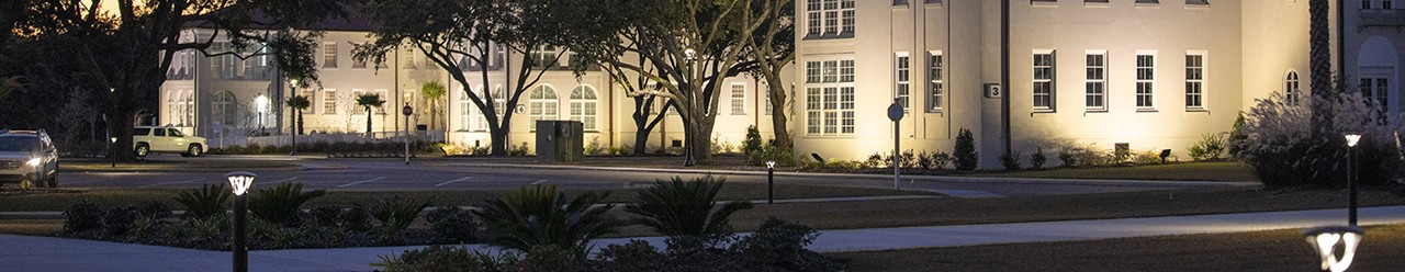 Parking deck at night with outdoor lighting