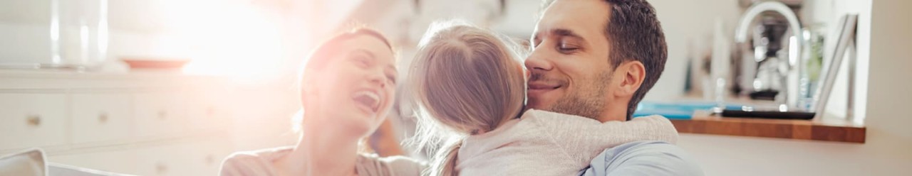 happy young family playing at home