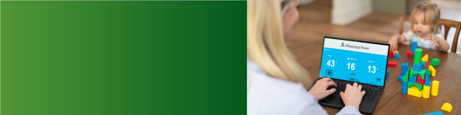 Woman taking the Online Home Energy Checkup with child playing in background