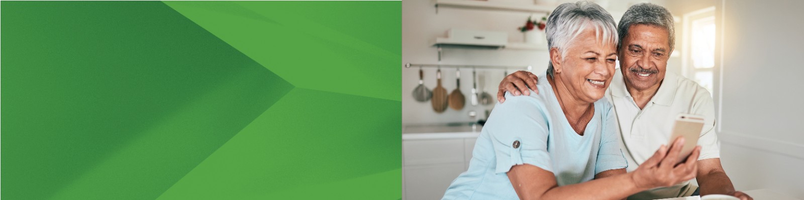 Senior couple looking at a smart phone