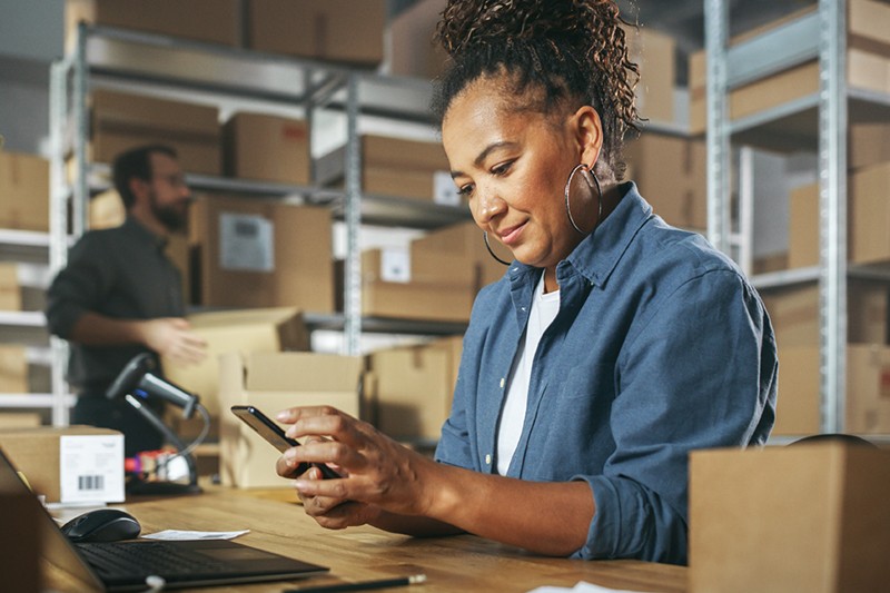 Man and woman in warehouse
