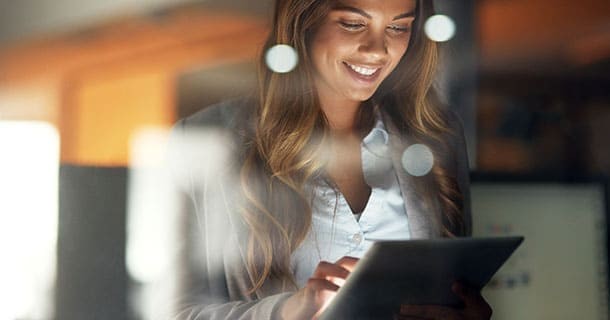 woman observing pricing and rates on ipad