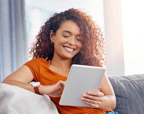 woman on ipad conducting an online energy inspection 