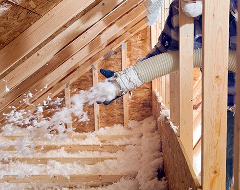 ceiling insulation spraying into attic